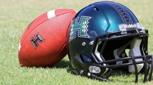 University of Hawaii football team helmet and football