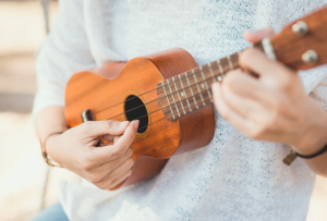 ukulele photo of someone playing